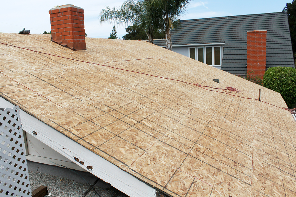 RGB Construction roofing professional installing plywood roof sheathing in Cherry Hill NJ