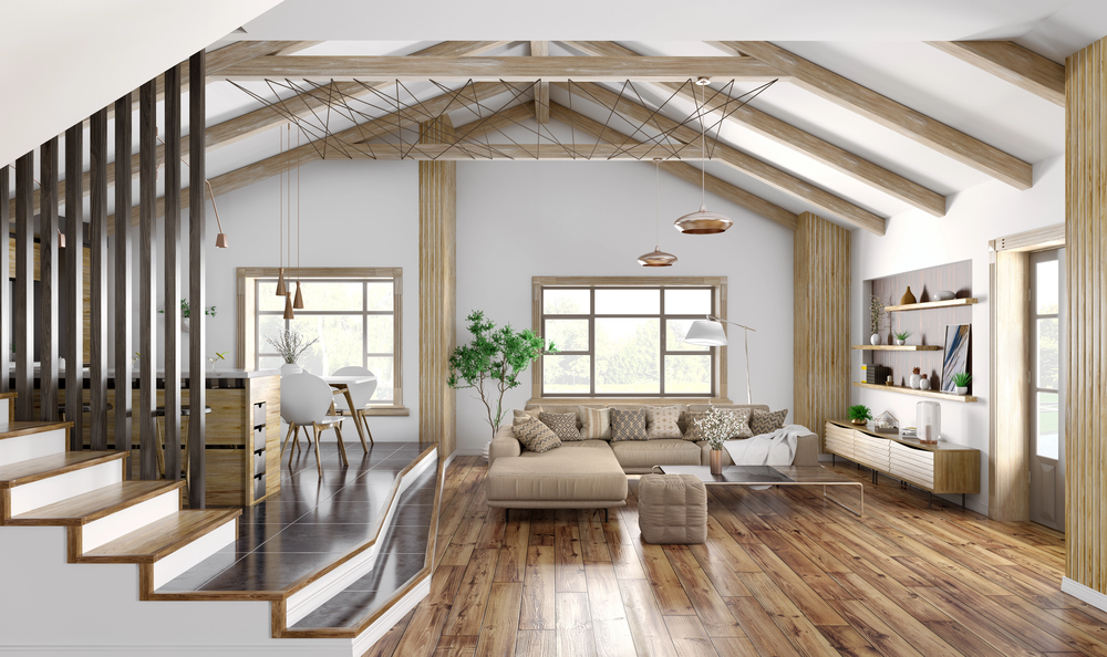 Modern vaulted ceiling with exposed wooden beams in a living room.